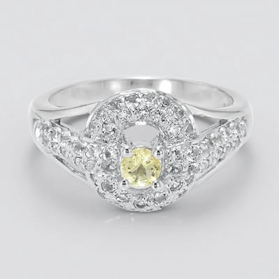 Cavill - Zilveren ring met 0,16 ct neongele danburiet uit Tanzania - 925 sterling zilver - 54 witte topaasjes pavé - Moderne elegante damesring