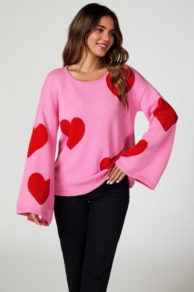 Oversized rode trui met wijde mouwen en roze hart