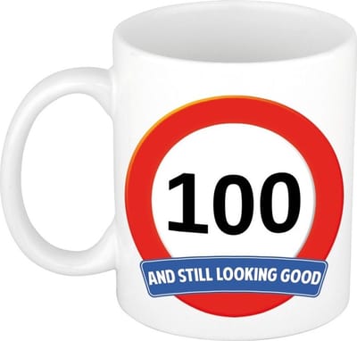 Koffie mok / cadeau beker - 100 jaar - verjaardag - still looking good - wit - stopbord - 300 ml - keramiek