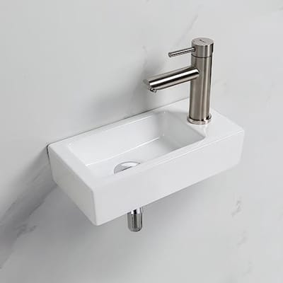 Compacte wandwastafel in keramiek - ruimtebesparend en eenvoudig te reinigen