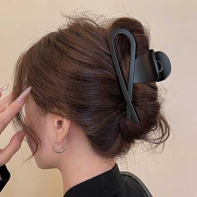Grote matte zwarte haarclip van kunststof met sterke grip en dubbele rijen voor dik haar, niet-slip design