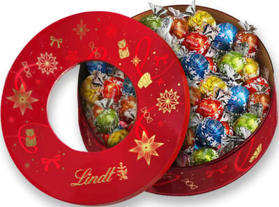 Lindt Kerst blik met chocolade bonbons 550 gram - 44 zacht smeltende LINDOR chocolade bonbons - Ideaal Kerstcadeau - Melkchocolade - Witte Chocolade - Hazelnoot Chocolade - Pure chocolade - Pistache chocolade