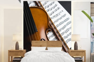 Behang - Fotobehang Viool op zwarte achtergrond met bladmuziek - Breedte 175 cm x hoogte 240 cm