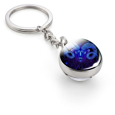 Zilverkleurige ronde sleutelhanger met blauwe ram afbeelding – sleutelhanger voor dames en heren – metalen keychain met ram symbool hanger en schakel ketting