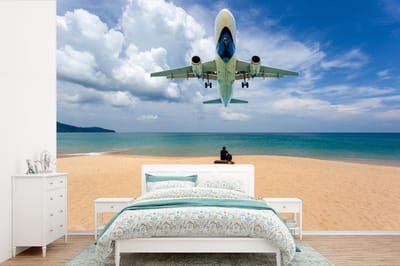 Behang - Fotobehang Strand - Zee - Vliegtuig - Breedte 450 cm x hoogte 300 cm