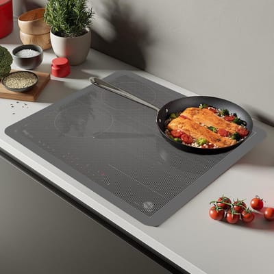 Inductiemat 52 x 60 cm van siliconen, hittebestendig tot 250 °C, antislip en krasbestendig voor inductiekookplaten