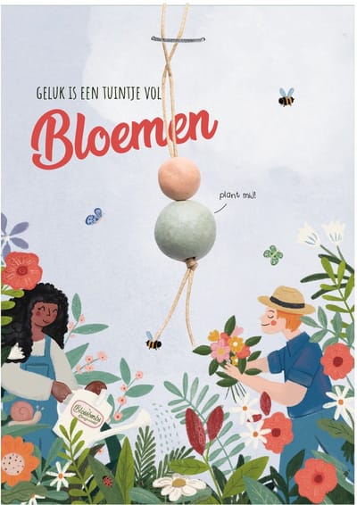 Blossombs Wenskaart met Gelukspoppetje - Hanger met 2 Zaadbommetjes - Geluk is een Tuintje Vol Bloemen