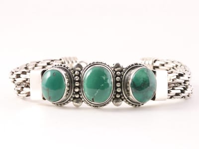 Zware gevlochten zilveren armband met Tibetaanse groene turkoois