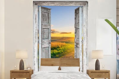 Behang - Fotobehang Doorkijk - Platteland - Landschap - Zon - Breedte 225 cm x hoogte 350 cm