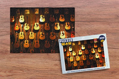 Puzzel Veel akoestische gitaren hangen aan een muur - Legpuzzel - Puzzel 500 stukjes
