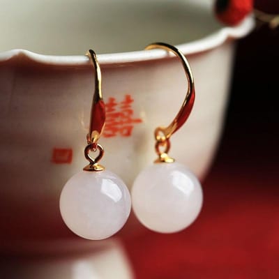ingelegde natuurlijke Hetian witte jade oorbellen Chinese stijl retro minderheidsontwerp lichte luxe charme damesmerk sieraden brown