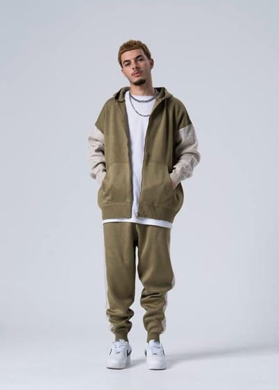 Trendy Tricot trainingspak met Capuchon