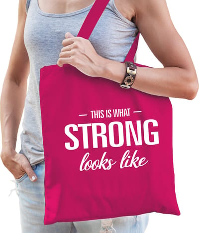 This is what strong looks like cadeau katoenen tas roze voor dames - kado tas / tasje / shopper voor een sterke dame / vrouw