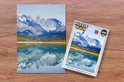 Puzzel Een wit Torres del Pain door de witte sneeuw die op de bergen zijn gevallen - Legpuzzel - Puzzel 1000 stukjes volwassenen