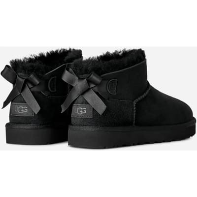 UGG® Ultra Mini Bailey Bow Boot in Black, Size 9, Polyester/Leather