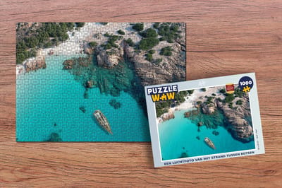 Puzzel Een luchtfoto van wit strand tussen rotsen - Legpuzzel - Puzzel 1000 stukjes volwassenen