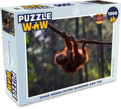 Puzzel Jonge orang-oetan hangend aan tak - Legpuzzel - Puzzel 1000 stukjes volwassenen
