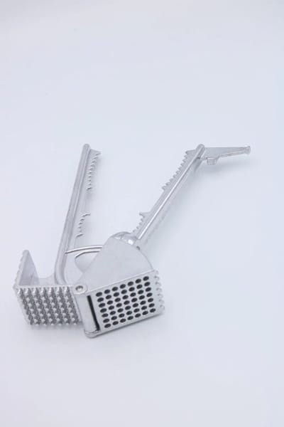 Multi functionele knoflook pers