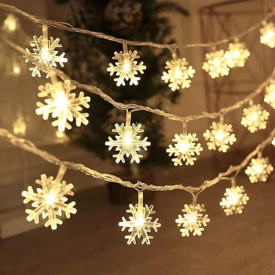 Kerstversiering - 6 meter lange 20LED sneeuwvlokverlichting - op batterijen (een van de beste kerstverlichtingsproducten) - Fairy Lights voor slaapkamer, feest, thuiskantoor, kerstdecoratie, binnen- en buitenboomdecoraties, warm wit