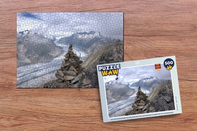 Puzzel De Aletschgletsjer in Zwitserland met gestapelde stenen op de voorgrond - Legpuzzel - Puzzel 500 stukjes