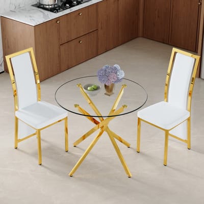 Tafel- en stoelenset. Luxe eettafel van 88 cm, gemaakt van gehard glas met een goudkleurig kruisvormig metalen frame, gecombineerd met 2 minimalistische witte PU-eetkamerstoelen met gouden accenten.