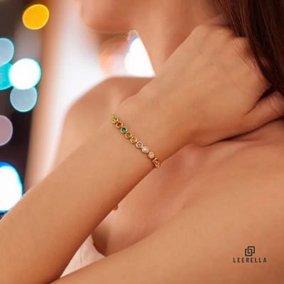Leerella Schitterende Goudkleurig RVS Armband met Regenboog Cubic Zirconia - Dames Sieraad voor Elke Dag