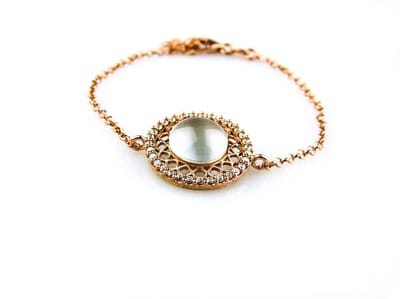 model Rondo armband in zilver roze verguld met lichtblauwe cabochon en cubic zirconia