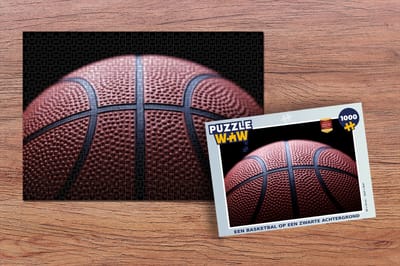 Puzzel Een Basketbal op een zwarte achtergrond - Legpuzzel - Puzzel 1000 stukjes volwassenen
