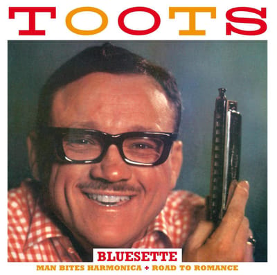 Man Bites Harmonica / Road To Romance