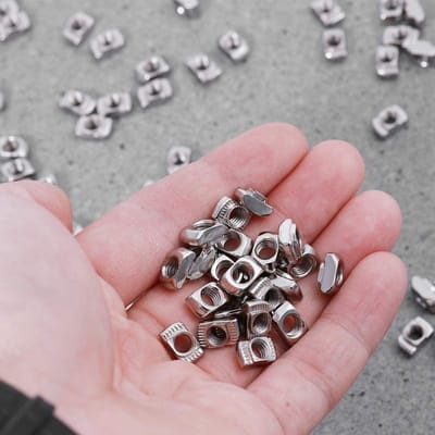 Dailygoods- T-moer 50st - Europese Standaard - Verzinkt Koolstofstaal - Bevestigingsmiddel - Extrusiesleuf - Hoge Hardheid - Bevestigingsmoer