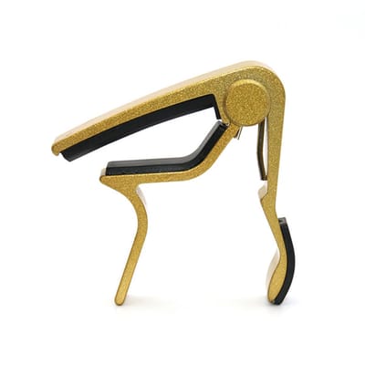 Capo - Gitaarklem - Platte toets - Gitaar capo met grip - Elektrisch, akoestisch en ukelele - Guitar capodaster - Gitaar /muziek accessoire - Aluminium - Goud - Jonyx