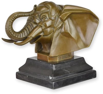 EEN BRONZEN BEELD VAN EEN OLIFANTENKOP