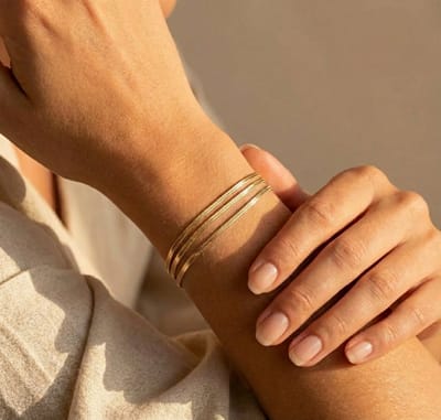 Lundholm Luxe Armband Dames Goud Kleurig – Premium Stainless Steel Jewellery – Goudkleurig Drie Laags Minimalistische Armband – My Bibi Serie - Scandinavisch Design