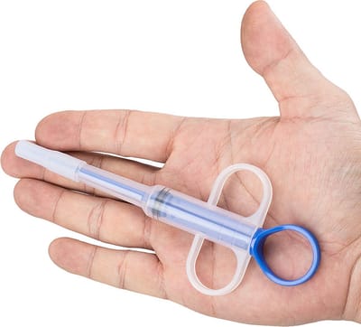 pillenschieter blauw - pillen gun - voedingsspuit - hulpmiddel medicatie