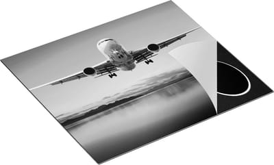 Chefcare Inductie Beschermer Vliegtuig Vliegt Boven een Kleurrijke Zee - Zwart Wit - 60x50 cm - Afdekplaat Inductie - Kookplaat Beschermer - Inductie Mat