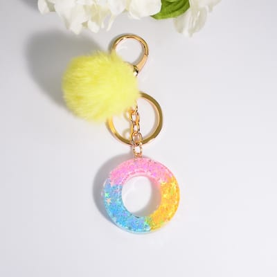Sleutelhangers of voor je tas van A tot Z - met een pompon of kwastje - met letter - mooi design - handgemaakt - sleutelhangers - design - mode - goud - zwart - blauw - roze- rood