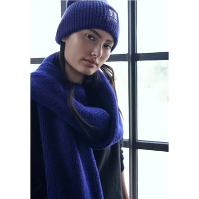 Beanie met badge