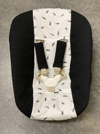 stokke newborn hoes zwart kleine veertjes