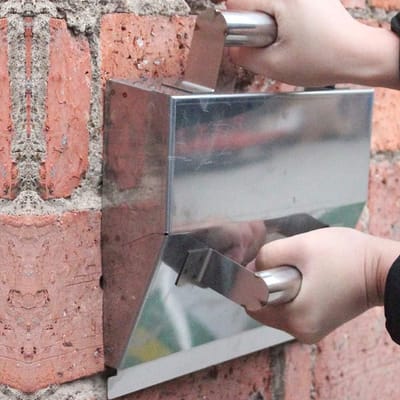 Veelzijdige Roestvrijstalen Pleisterspaan - Efficiënt Handpleisteren met Dubbele Handgreep voor Hoeken en Professionele Afwerking van Tegels en Decoratie
