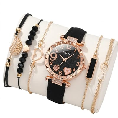 Zwart analoog horloge dames – ronde wijzerplaat met goudkleurige details en hartmotief – zwarte band met goudkleurige accenten – quartz horloge (set zonder box)