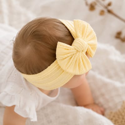 Haar in Stijl ® Haarband Heidi Lichtgeel - Brede en zachte baby haarband met een strik