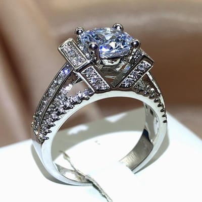 Bague de mariage en cristal incrusté en forme de V pour femme, design unique de haute qualité, bague de mariage en alliage d'étain, couleur argent, bague d'amour de luxe 6 blanc