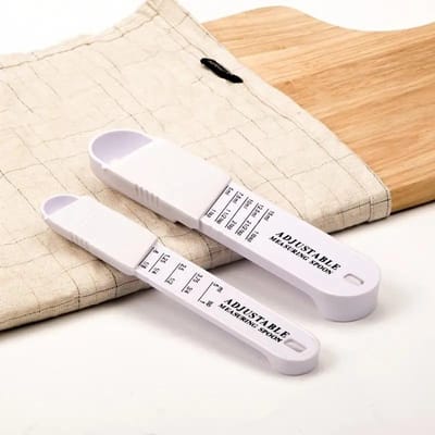 Facilitez la pâtisserie et la cuisine avec cet ensemble de 2 cuillères à mesurer réglables. Parfait pour le café, le sucre, le sel et la poudre. blanc