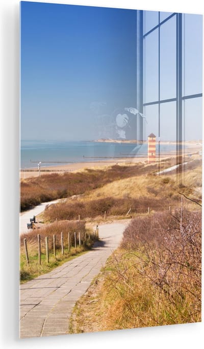 MuchoWow® Glasschilderij 100x150 cm - Schilderij acrylglas - Strand - Zee - Vuurtoren - Nederland - Foto op glas - Muurdecoratie woonkamer - Wanddecoratie slaapkamer - Schilderijen
