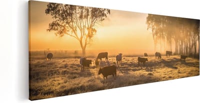 Artaza Canvas Schilderij Koe - 60x20 cm - Wanddecoratie Weiland - Muurdecoratie Bomen - Kamer Accessoires Zonsondergang