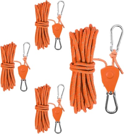 Verstelbare camping touwen met katrol, reflecterende spanbanden en oranje nylon - ideaal voor tenten en buitenactiviteiten