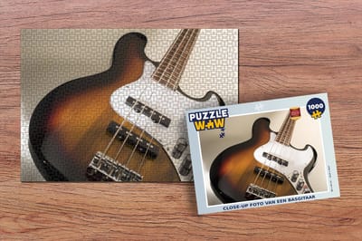 Puzzel Close-up foto van een basgitaar - Legpuzzel - Puzzel 1000 stukjes volwassenen
