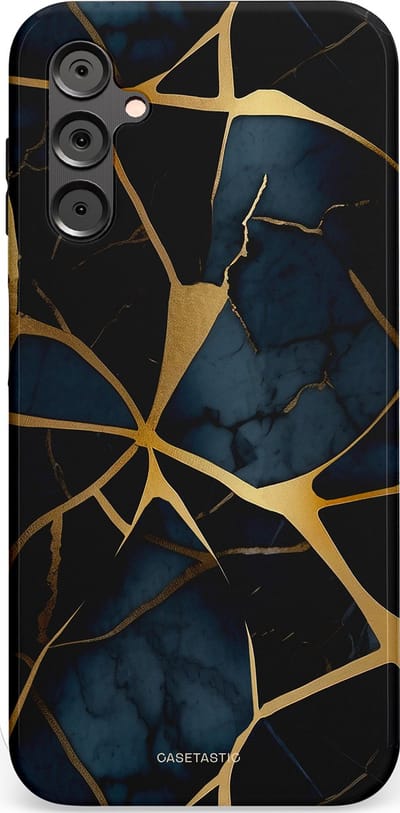 Casetastic hoesje geschikt voor Samsung Galaxy A14 (2023) 5G / Samsung Galaxy A14 (2023) 4G - Dubbellaagse bescherming - Sterrennacht Marmer Goud - Fashion Case - Zwart Goud Donkerblauw