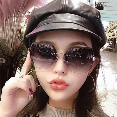 Internetberoemdheid inss straatfotografie van UV-zonnebrillen voor dames zonder montuur kristallen geslepen rand dames ultraviolette zonnebrillen source factory straight hair