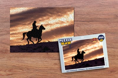 Puzzel Een eenzame cowboy bij zonsondergang - Legpuzzel - Puzzel 500 stukjes